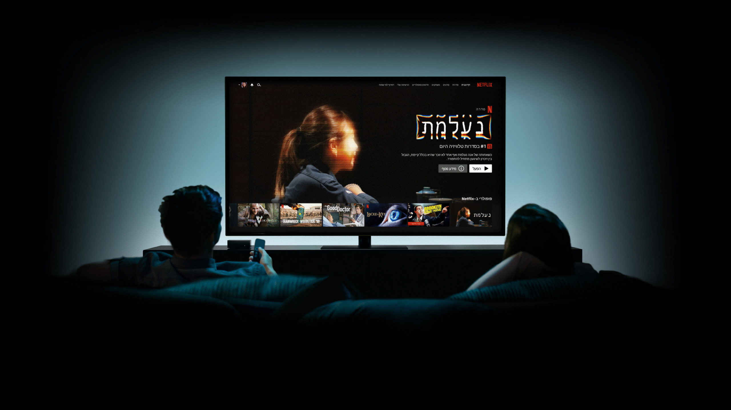 mockup of 2 people watching netflix interface on the tv with Gone in the recommended